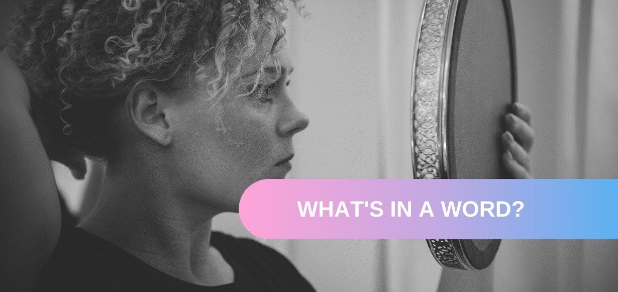 woman looking in the mirror